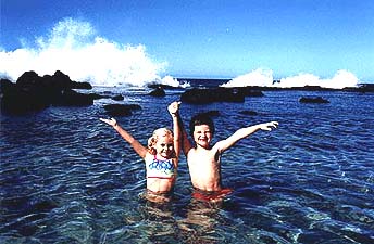 Julia and Griffin in the surf